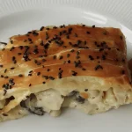 tarte-de-massa-folhada-com-frango-cogumelos-e-queijo-receita.webp.webp